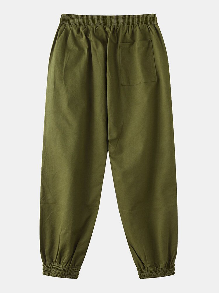 Pantalones Harén Casuales De Color Sólido Con Cordón Y Bolsillo Para Hombre