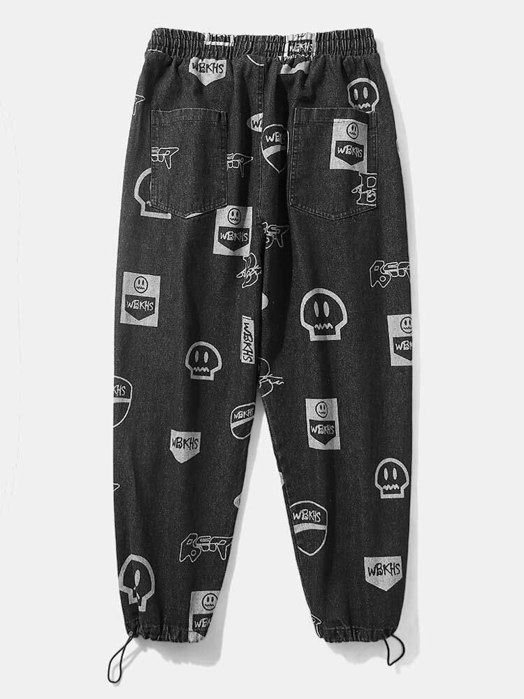 Pantalones De Mezclilla Con Puños Con Cordón Y Estampado De Muecas De Dibujos Animados Para Hombre