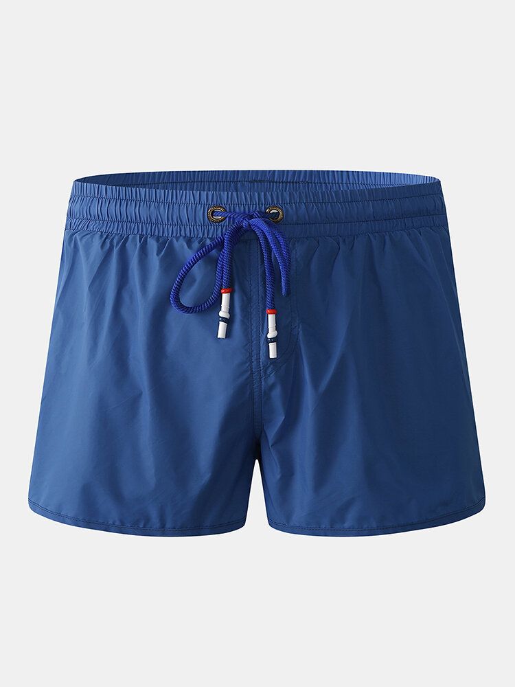 Pantalones Cortos Casuales De Playa Con Cordón De Secado Rápido De Color Sólido Para Hombre Con Forro De Compresión