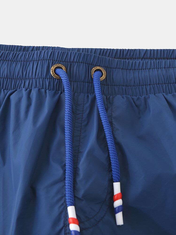 Pantalones Cortos Casuales De Playa Con Cordón De Secado Rápido De Color Sólido Para Hombre Con Forro De Compresión