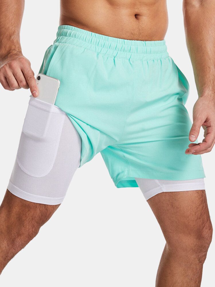 Pantalones Cortos Deportivos De Secado Rápido De Color Sólido Para Hombre Que Ejecutan Pantalones Cortos Elásticos Casuales De Doble Capa