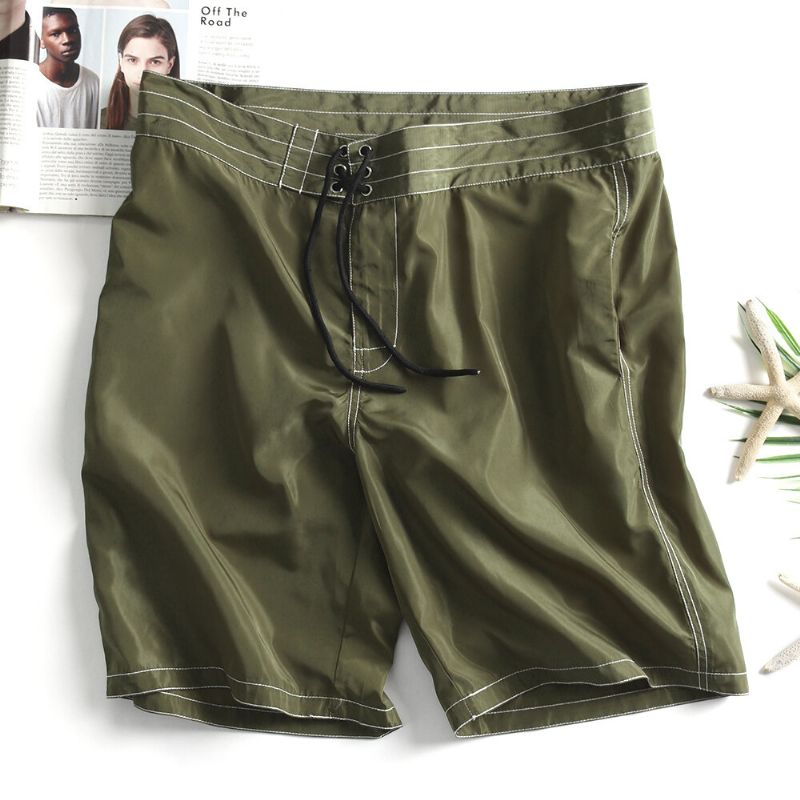 Tablero De Secado Rápido Para Hombres Corto Color Sólido Kintting Bolsillos Traseros Sueltos Pantalones Cortos De Playa De Vacaciones