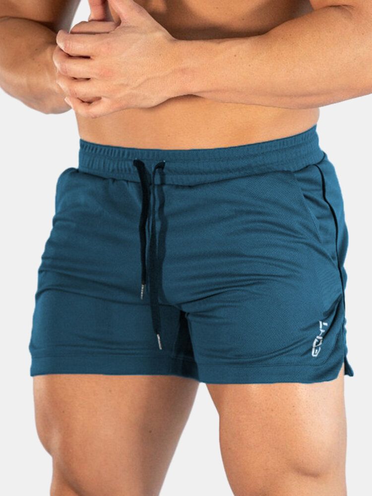 Pantalones Cortos De Cintura Con Cordón De Playa Elásticos Finos Y Sueltos Deportivos De Secado Rápido De Color Sólido Para Hombre