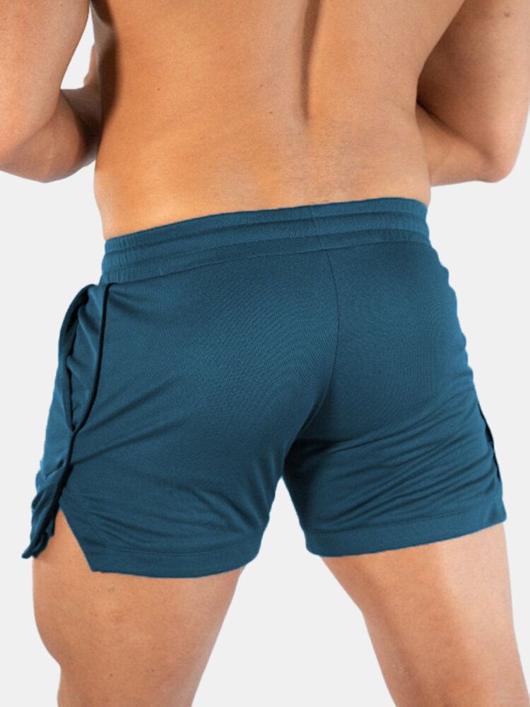 Pantalones Cortos De Cintura Con Cordón De Playa Elásticos Finos Y Sueltos Deportivos De Secado Rápido De Color Sólido Para Hombre