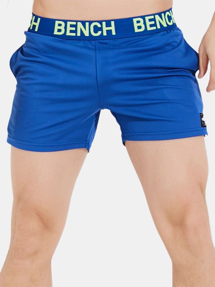 Pantalones Cortos Deportivos De Cintura Media Transpirables De Secado Rápido Con Cintura De Retazos De Color Sólido Para Hombre