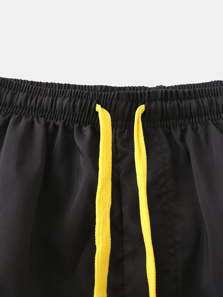 Pantalones Cortos Deportivos Transpirables De Secado Rápido Con Bolsillos Con Cremallera De Color En Contraste Para Hombre