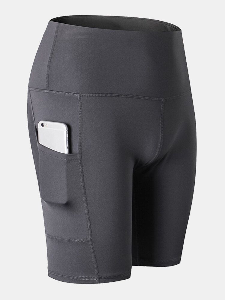 Pantalones Cortos Deportivos De Yoga De Secado Rápido De Color Sólido Para Mujer Con Bolsillo Lateral