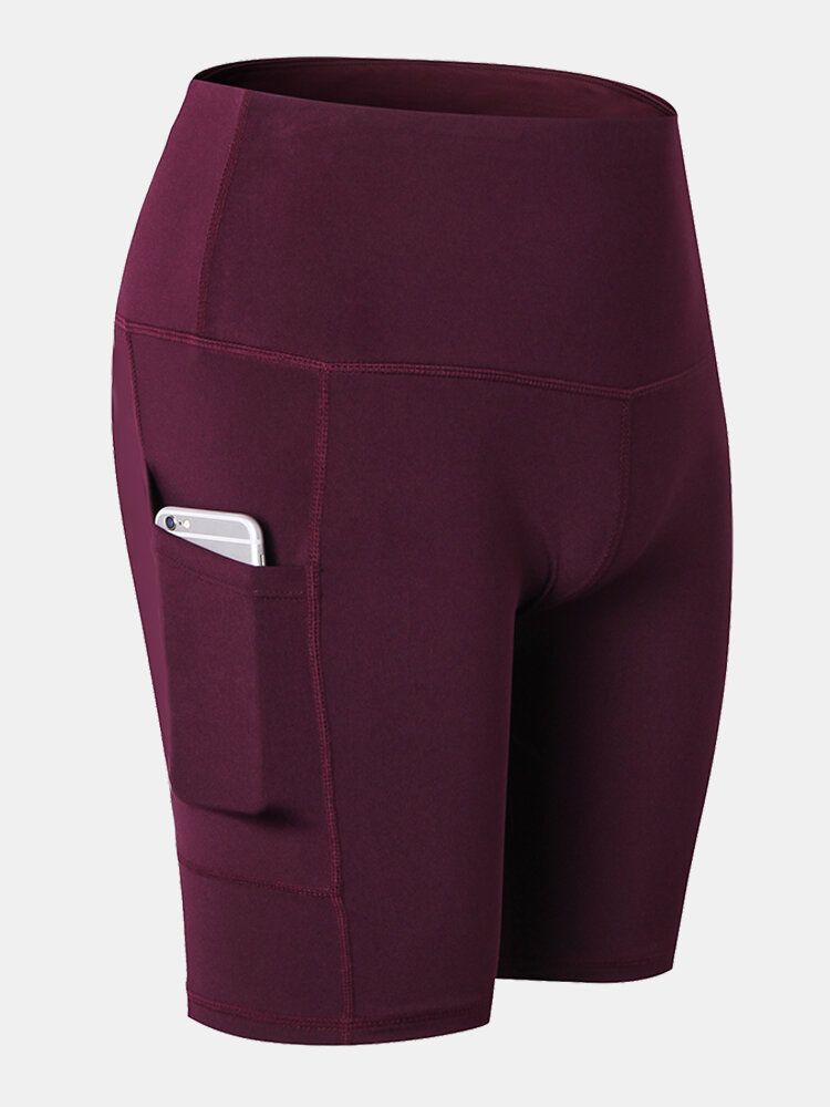 Pantalones Cortos Deportivos De Yoga De Secado Rápido De Color Sólido Para Mujer Con Bolsillo Lateral