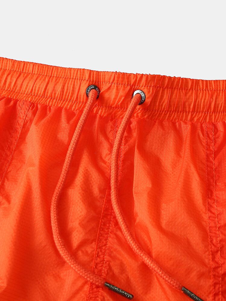 Pantalones Cortos Sueltos Para El Hogar De Cintura Elástica Con Cordón Transpirable De Secado Rápido Para Deportes De Color Sólido Para Hombre