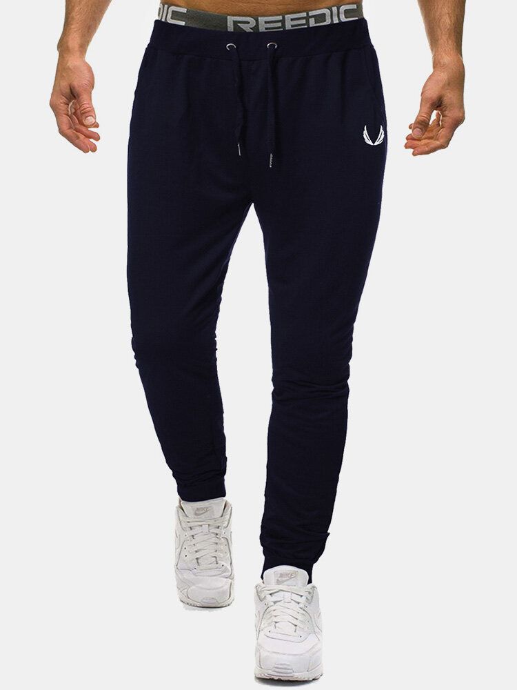 Pantalones Deportivos De Algodón Para Hombre Con Bolsillo Con Estampado De Color Sólido Y Cordón