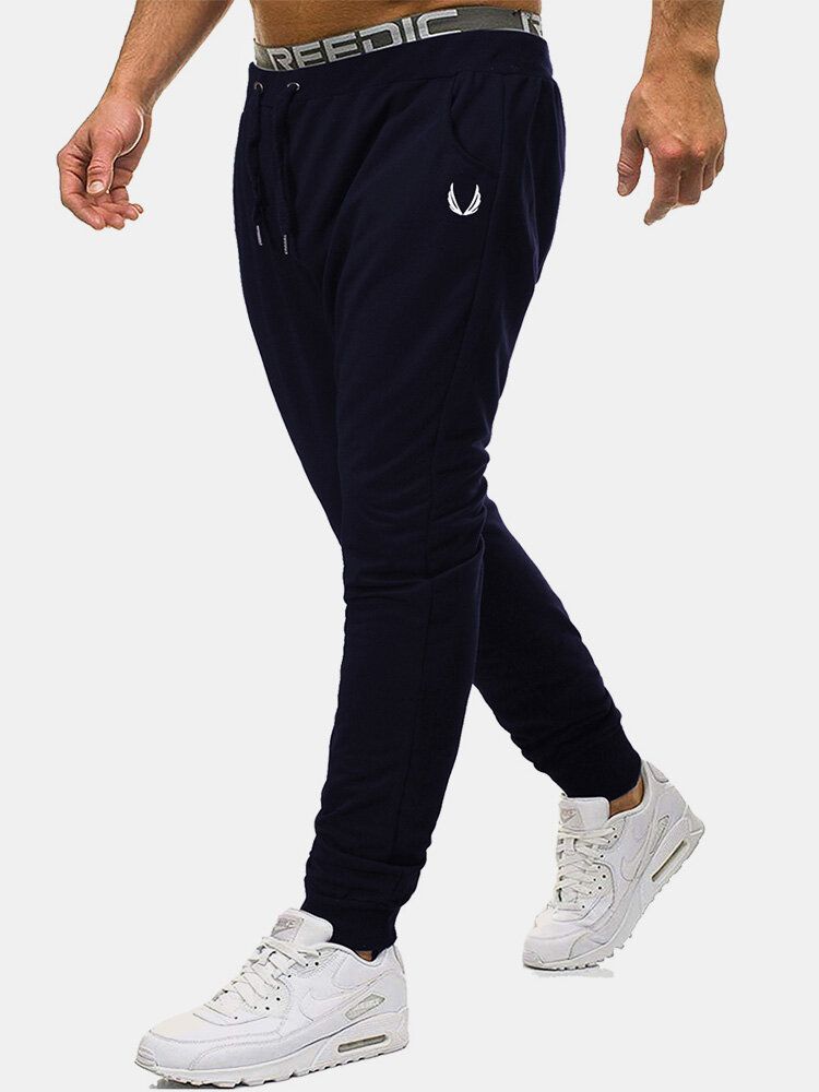 Pantalones Deportivos De Algodón Para Hombre Con Bolsillo Con Estampado De Color Sólido Y Cordón