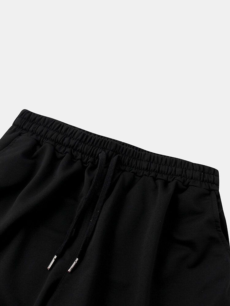 Shorts Deportivos Negros Con Bolsillo Con Cordón Y Estampado Para Hombre