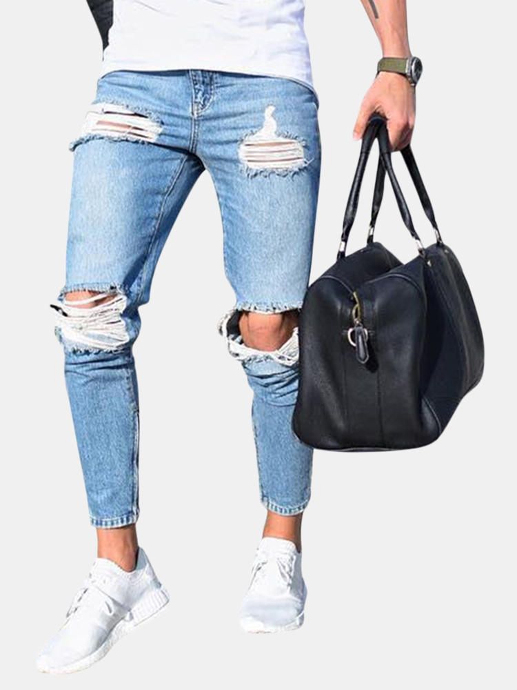 Jeans Azules Ajustados De Cintura Baja Con Estilo Rasgado