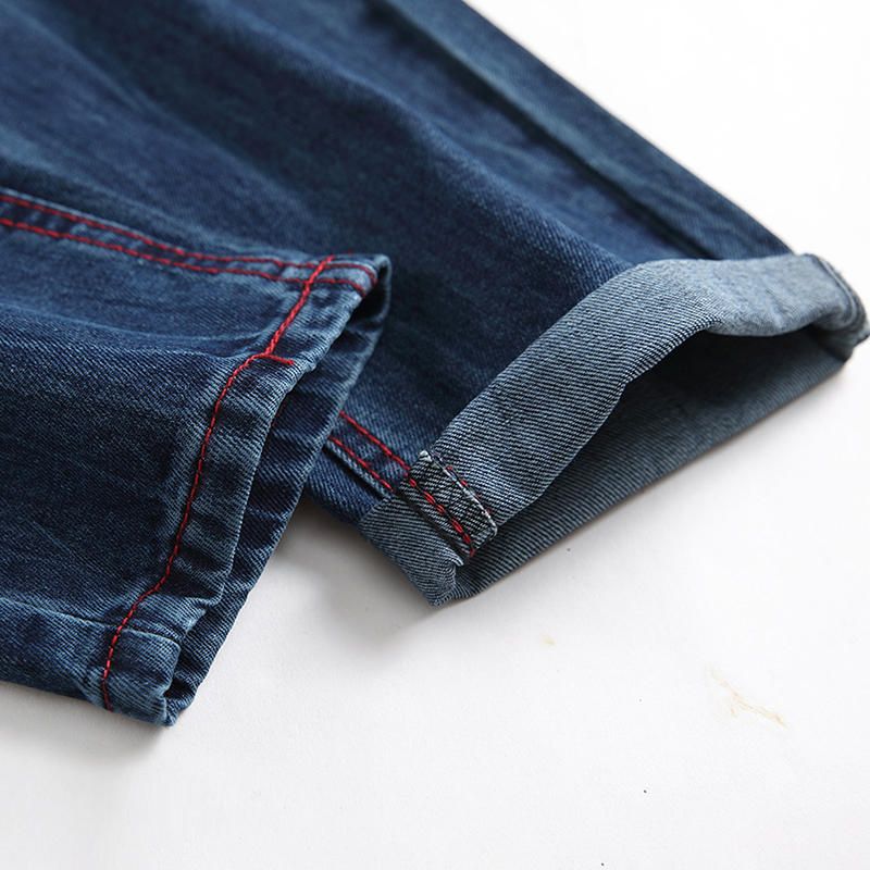 Jeans Con Agujeros De Costura Rojos Con Estilo Para Hombres