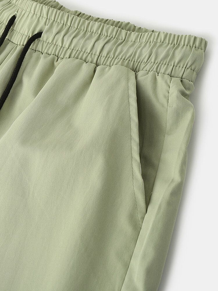 Pantalones Cortos Casuales De Ajuste Holgado Con Cordón De Color Sólido De Algodón Para Hombre