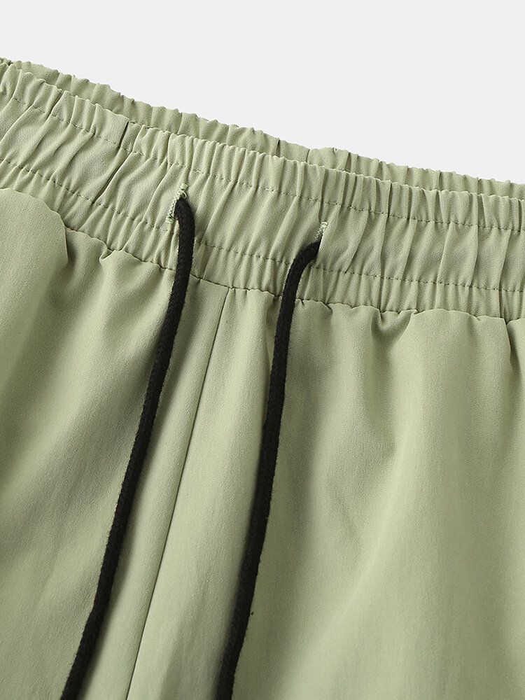 Pantalones Cortos Casuales De Ajuste Holgado Con Cordón De Color Sólido De Algodón Para Hombre