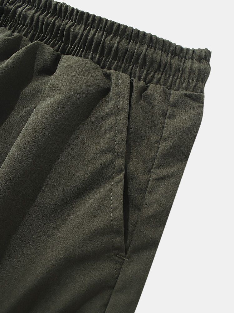 Pantalones Cortos Casuales Con Cordón De Cintura Elástica Con Múltiples Bolsillos Para Hombre