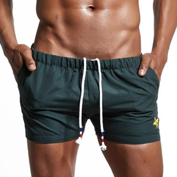 Pantalones Cortos De Playa Deportivos Para Correr Para Hombres De Verano Pantalones Cortos Casuales De Color Sólido Elásticos Para Surf Y Gimnasio