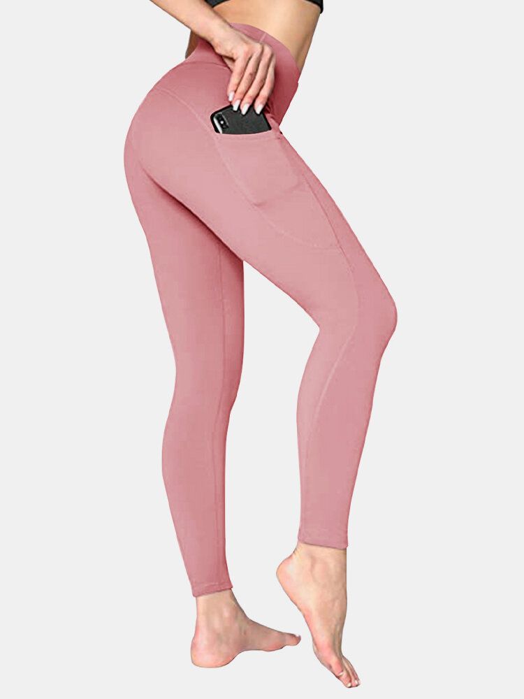 Legging De Yoga Deportivo De Levantamiento De Cadera Con Bolsillo Lateral De Color Sólido Para Mujer