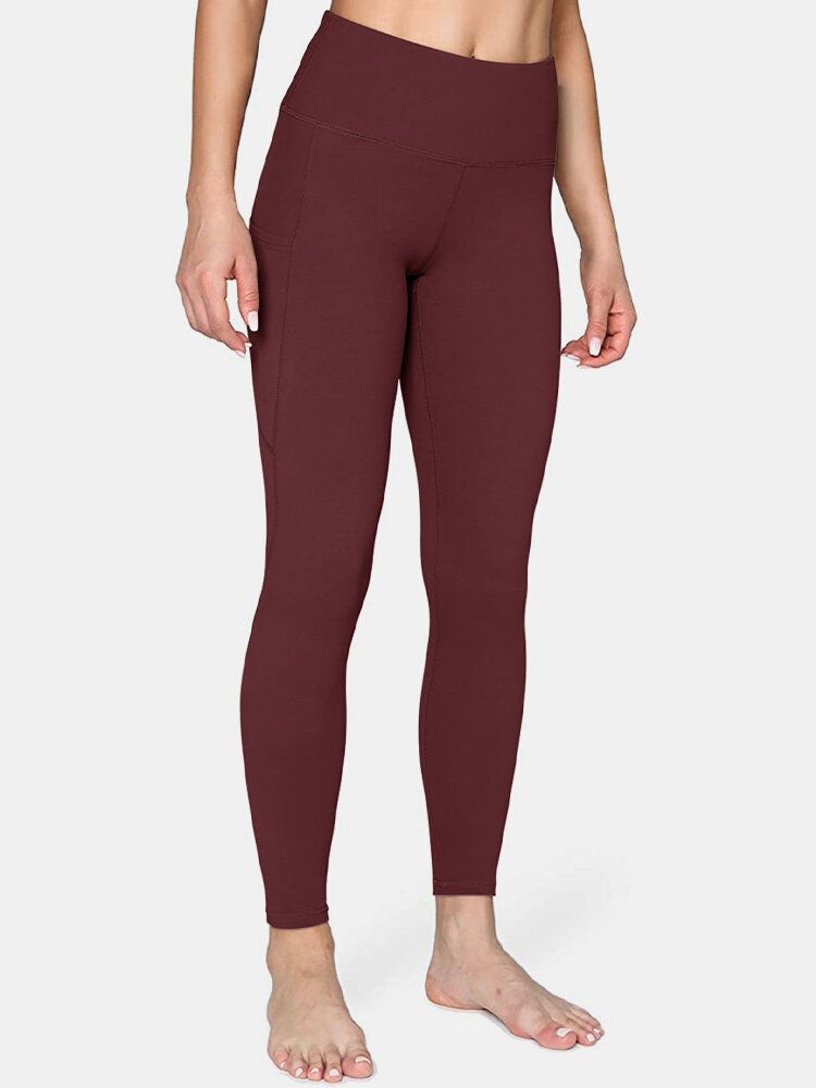 Legging De Yoga Deportivo De Levantamiento De Cadera Con Bolsillo Lateral De Color Sólido Para Mujer