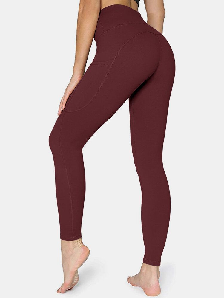 Legging De Yoga Deportivo De Levantamiento De Cadera Con Bolsillo Lateral De Color Sólido Para Mujer