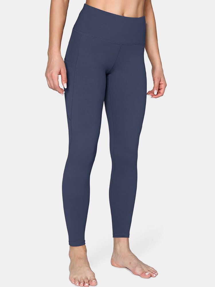 Legging De Yoga Deportivo De Levantamiento De Cadera Con Bolsillo Lateral De Color Sólido Para Mujer