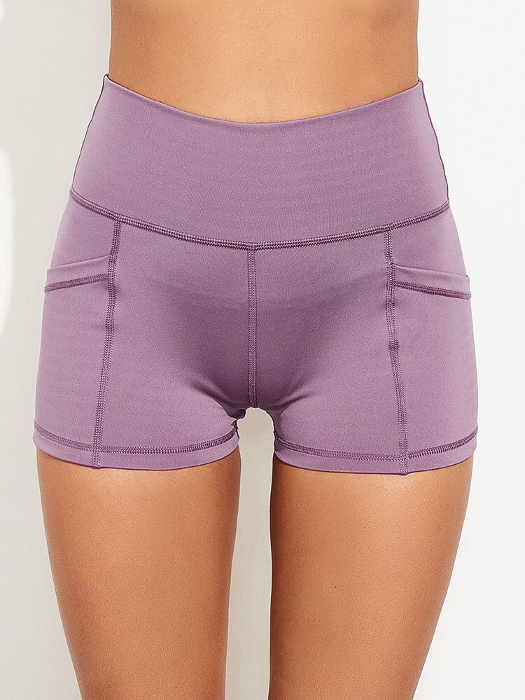 Leggings Cortos Con Bolsillo De Yoga Para Correr De Cintura Alta Con Costuras De Color Sólido Para Mujeres